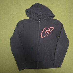 Black  hoodie featuring the "Smoking Devil" artwork designed by artist Coop